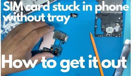 SIM card stuck in without tray .